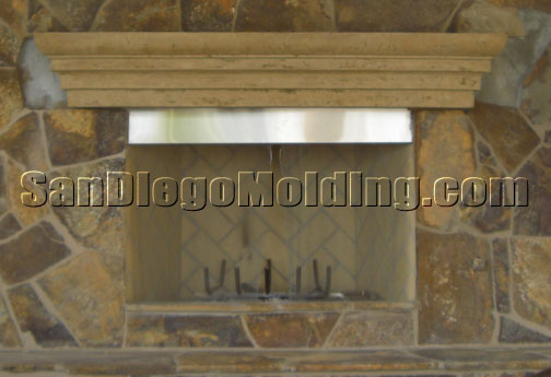 Faux limestone fireplace mantle